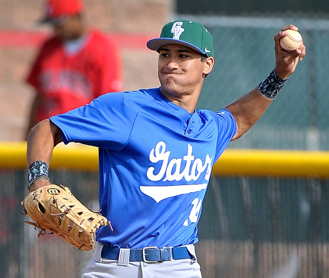 Green Valley first baseman Keola Paragas throws the ball during a recentl game against Las V ...