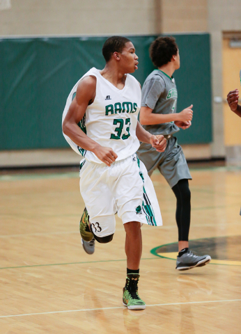 Rancho High School’s Lamont Traylor (33) runs the court against Green Valley earlier t ...