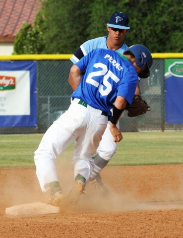 Green Valley’s Jarrett Perns steals second as Foothill’s Bligh Madris looks on i ...