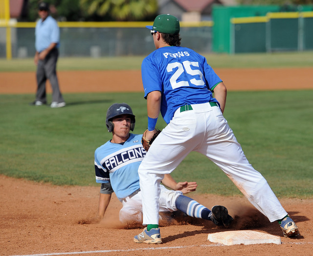 Foothill’s Austin Parenteau slides safely into third under Green Valley’s Jarret ...