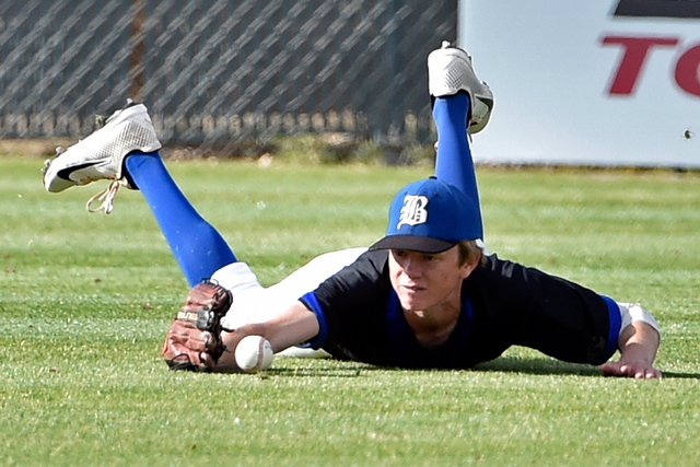 Basic outfielder Tanner Roundy misses the catch against Coronado during a high school baseba ...