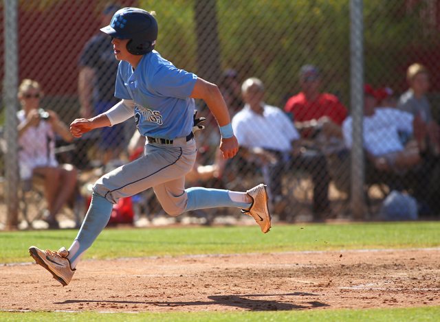 Centennial’s Ricky Koplow scores a run against Arbor View during the Sunset Region bas ...