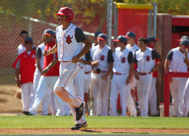 Arbor View’s Kaid Urban heads for home plate after his home run against Centennial in ...