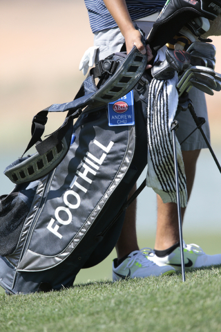 Foothill High School Senior Andrew Chu, holds on to his golf bag during final round of Divis ...