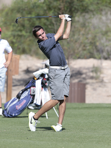 Foothill High School Senior Mason Reid, holds at the top of his swing while watching where h ...