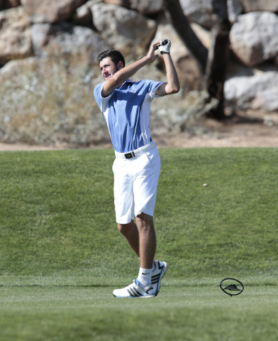 Green Valley’ High School’s Mason Comastro, tees off at the 12th hole during the ...