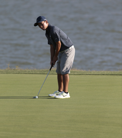 Foothill High School’s Andrew Chu, lines up for a put at the 17th hole, during the fin ...