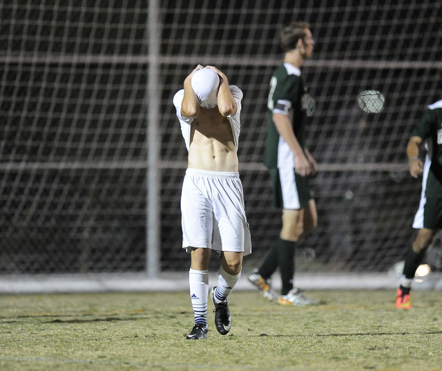 Shadow Ridge striker Jack Guynn reacts after a Shadow Ridge shot went over the Palo Verde go ...