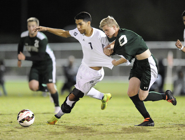 Palo Verde defender Ben DeLeon (8) and Shadow Ridge defender Harald Skjelbred-Knudsen (1) pu ...
