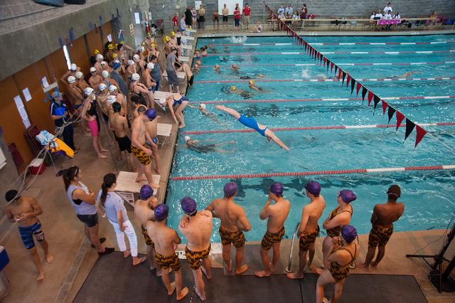 Racers warm up for the start of the Sunset Region meet on Saturday at UNLV. (Martin S. Fuent ...