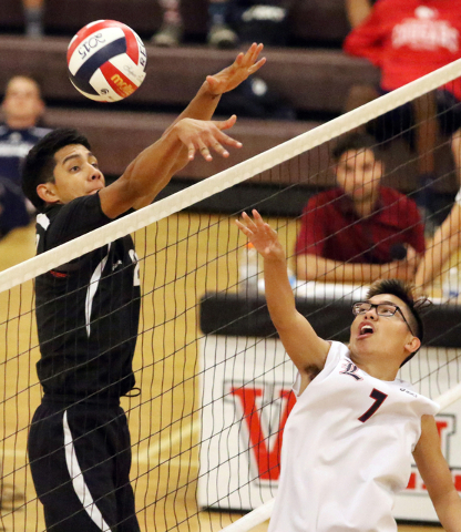 Rancho’s Martin Rodriguez, left, and Liberty’s Brycen Ivester battle at the net ...
