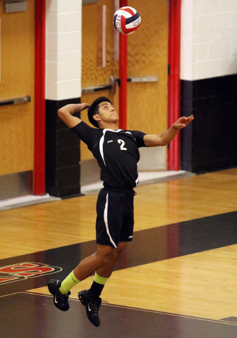 Rancho’s Martin Rodriguez serves the ball during the boys volleyball Sunrise Region to ...