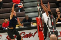 Legacy’s Trent Compton goes for a kill against Arbor View during a Sunset Region boys ...