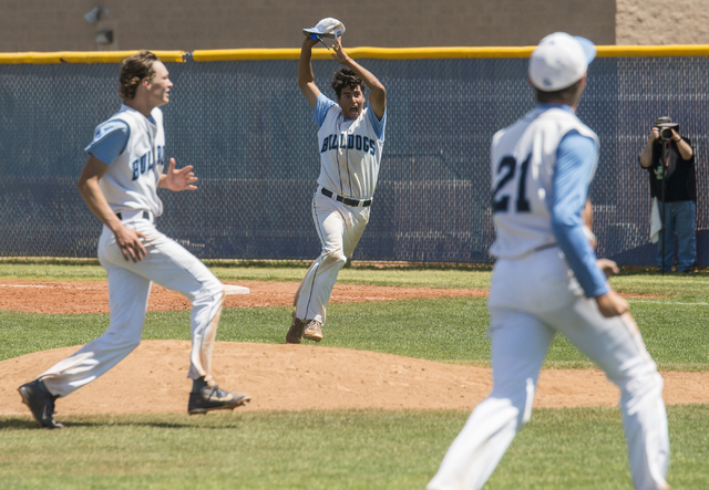 Centennial players celebrate their 8-4 victory over Bishop Gorman in the Sunset Region baseb ...