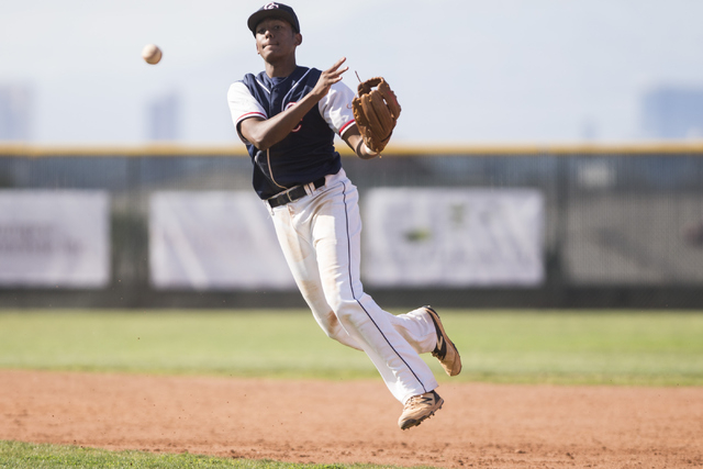 Coronado’s Noah Hemphill (9) throws to first base for an out against Liberty in the fi ...