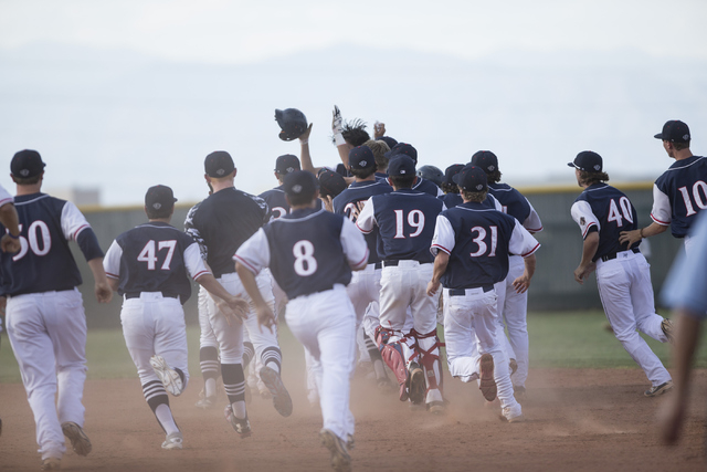 Coronado celebrates their walk off victory against Liberty in their baseball game at Coronad ...