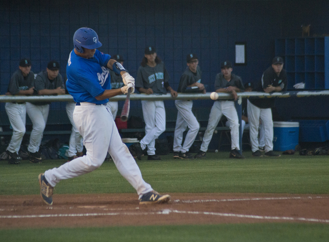 Green Valley’s Drake Maningo (9) swings at the ball during their game against Silverad ...