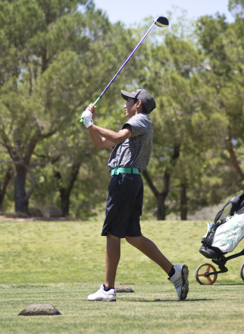 Cameron Barzekoff of Palo Verde High School watches his ball during the Sunset Region boys g ...