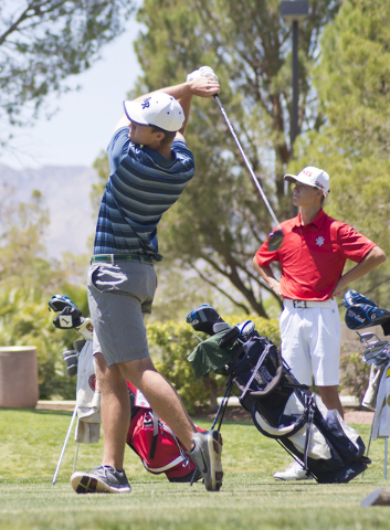 Shadow Ridge’s Tanner Johnson hits his ball during the Sunset Region boys golf tournam ...