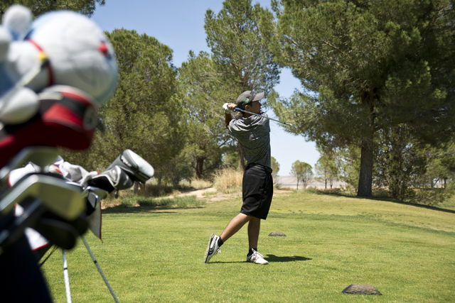 Palo Verde’s Jun Oshimoto hits his ball during the Sunset Region boys golf tournament ...