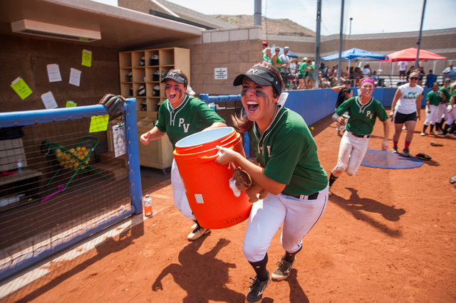 Palo Verde players Rachael Turner, left, and Rachel Williams grab a hold of the gatorade coo ...