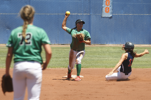 Tiare Lee of rancho catches the ball and throws it back to first as Ashleigh Rodriguez of Li ...