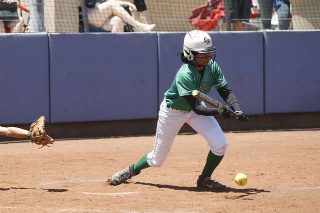 Jahnae Davis-Houston or Rancho hits the ball on May 14, 2016, at Bishop Gorman High School ...