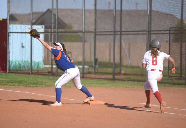 Bishop Gorman’s Kasey Bilodeau (2) catches the ball at first for an out against Arbor ...