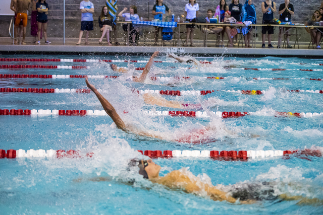 Swimmers compete during the Sunrise Region high school swim meet at the Bucky Buchanan Natat ...