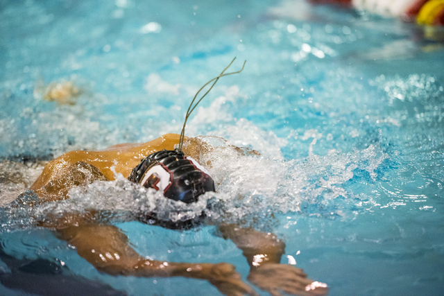 Jalen Tsuchiyama-Sando of Coronado swims during the Sunrise Region swim meet at the Bucky Bu ...