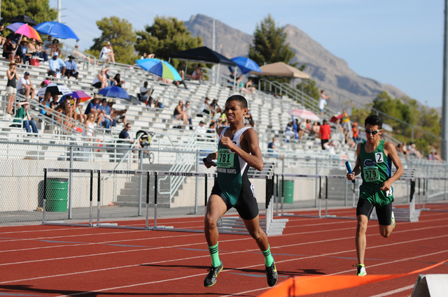 Rancho’s Lorenzo Johnson, left, finishes first followed by Green Valley’s Lenny ...