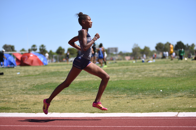 Centenniel’s Alexis Gourrier competes in the 1600-meter run at the Sunset Region meet ...