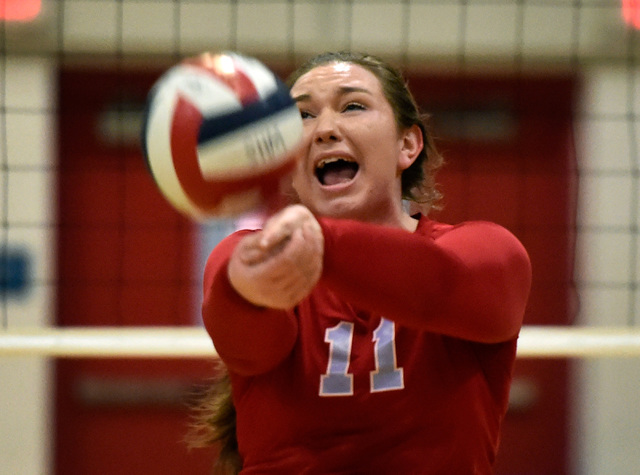 Western’s Nikki Riggs hits the ball against Pahrump Valley during a high school volley ...