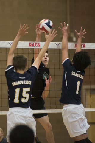 Palo Verde’s Chandler Juilfs (12) goes up to spike the ball against Shadow Ridge&#8217 ...