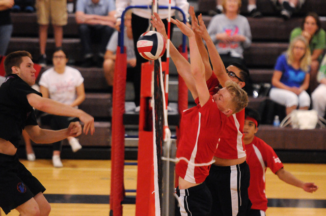 Las Vegas Chris Kampshoff (9) and Guillermo Gonzalez (7) block a spiked by Valley’s Za ...