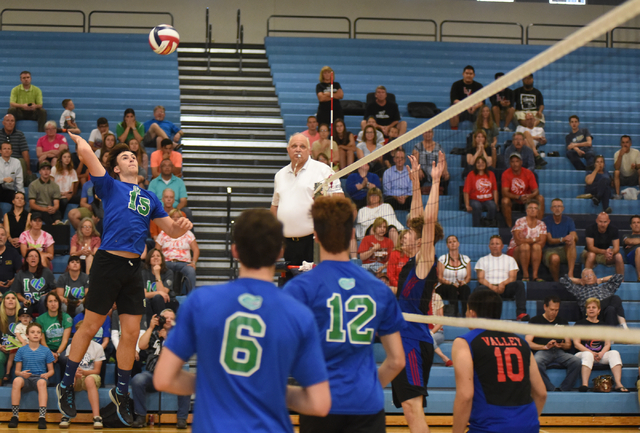 Green Valley’s Dustin Elliott (15) goes up for a spike against Valley during their vol ...