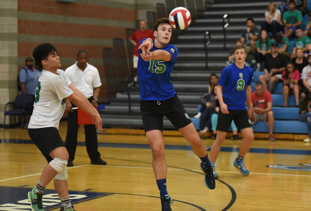 Green Valley’s Dustin Elliott (15) digs the ball against Valley during their volleybal ...