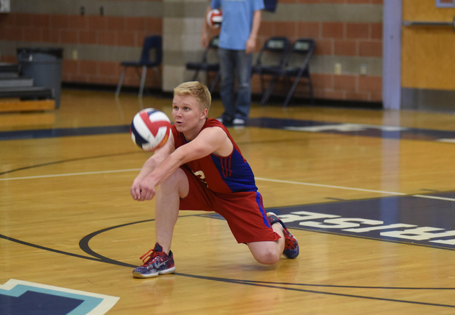 Valley’s Austin Smith (3) digs the ball against Green Valley during their volleyball g ...