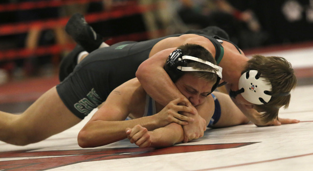 Green Valley’s Wallace Zernich, top, crossfaces Foothill’s Steven Lopez during a ...
