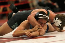 Green Valley’s Wallace Zernich, top, crossfaces Foothill’s Steven Lopez during a ...