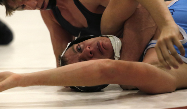Green Valley’s Wallace Zernich, top, wrestles Foothill’s Steven Lopez during a 1 ...