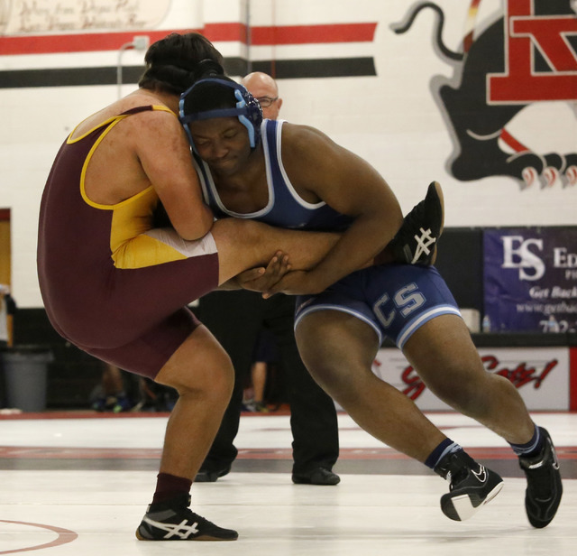 Canyon Spring’s Lord Oroke, right, shoots a single against Eldorado’s Paul Velar ...