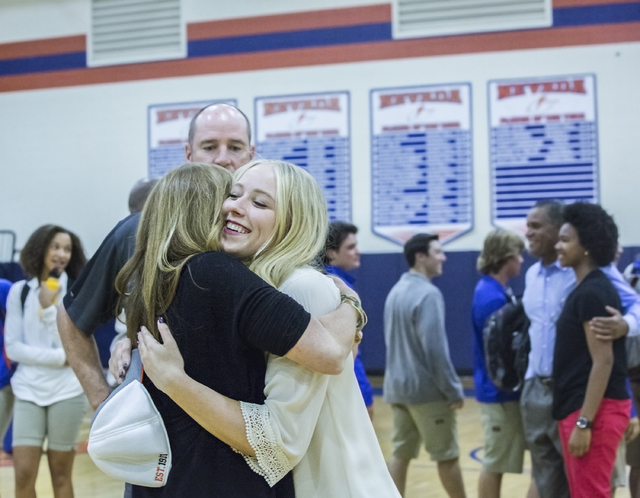 Bishop Gorman’s Abbey Archambault hugs her mother Nancy Archambault during an event fo ...
