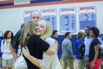 Bishop Gorman’s Abbey Archambault hugs her mother Nancy Archambault during an event fo ...