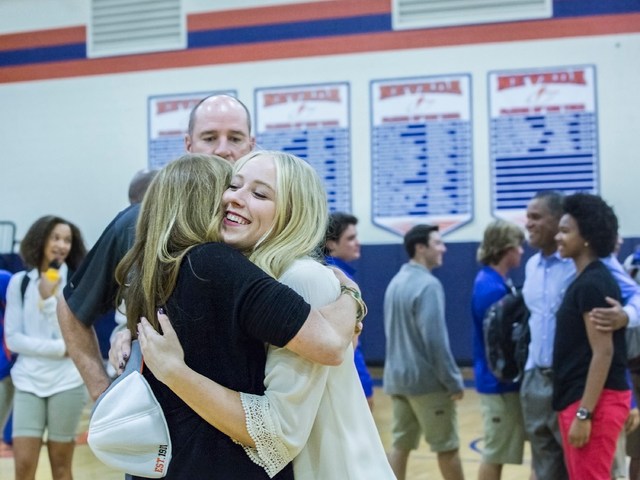 Bishop Gorman’s Abbey Archambault hugs her mother Nancy Archambault during an event fo ...