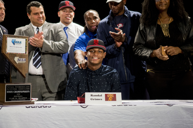 Senior Randal Grimes signs to play college football for University of Southern California at ...
