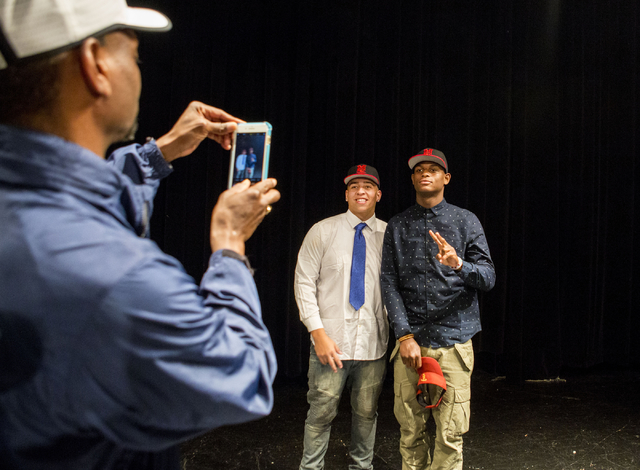Desert Pines High School Seniors Monquel Galsow, left, and Randal Grimes, take a photo toget ...