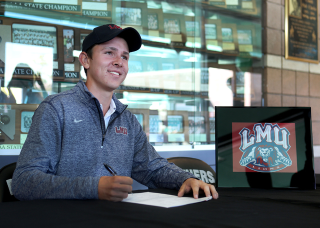 Palo Verde senior Cameron Meeks signs his paperwork for playing golf at Loyola Marymount Uni ...