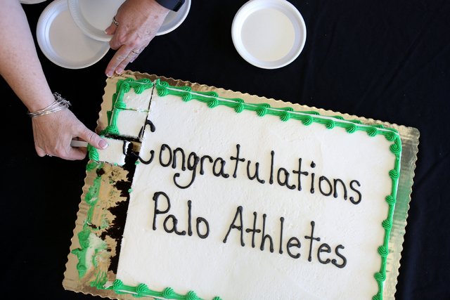 A cake is cut in celebration of the Palo Verde senior athletes that were chosen to play thei ...