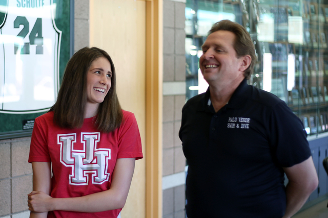 Palo Verde senior Reese Lamph is celebrated by her swimming coach Brent Gonzalez at Palo Ver ...